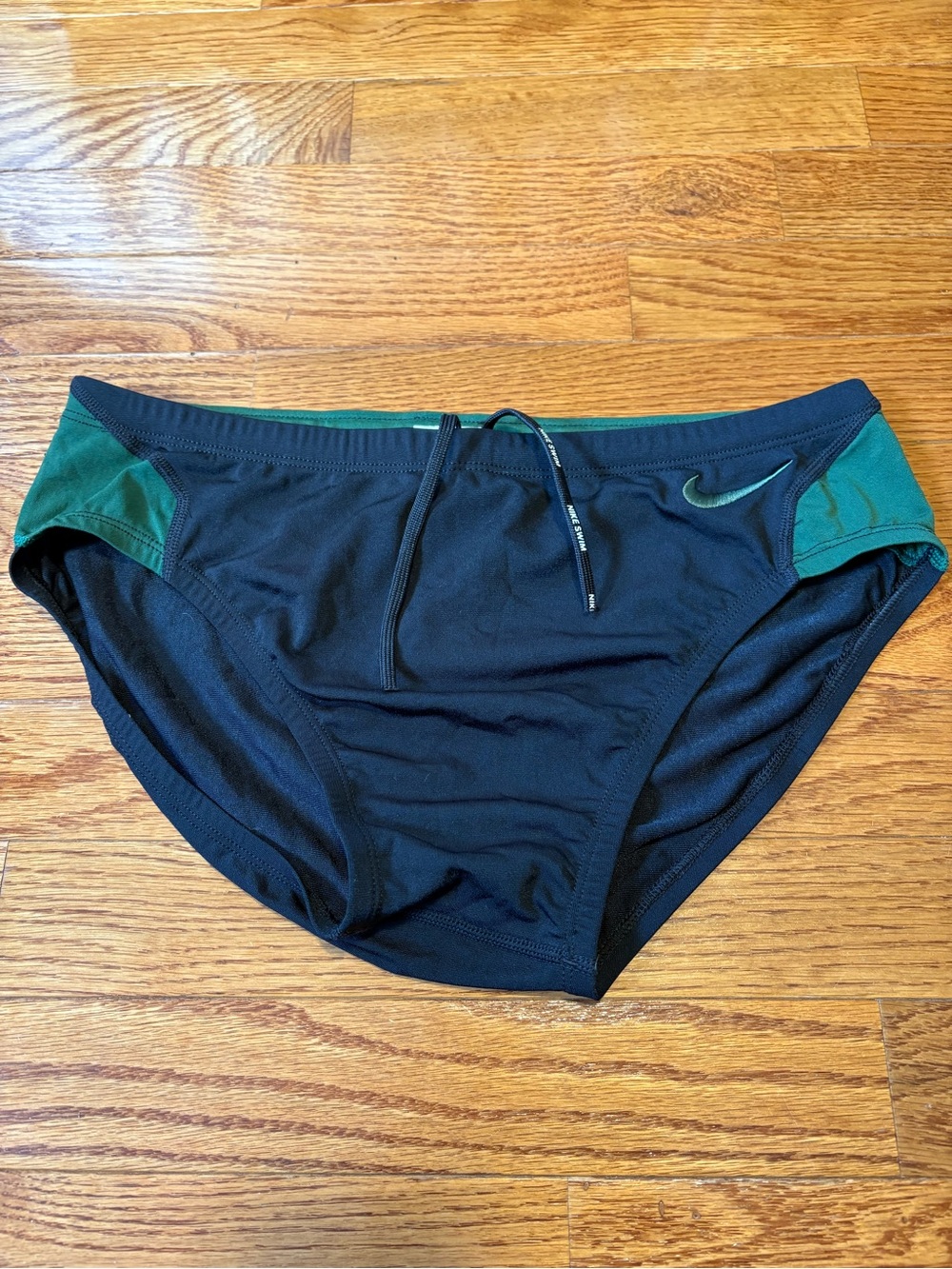 Nike Men’s Black Swim Briefs with Green Accents